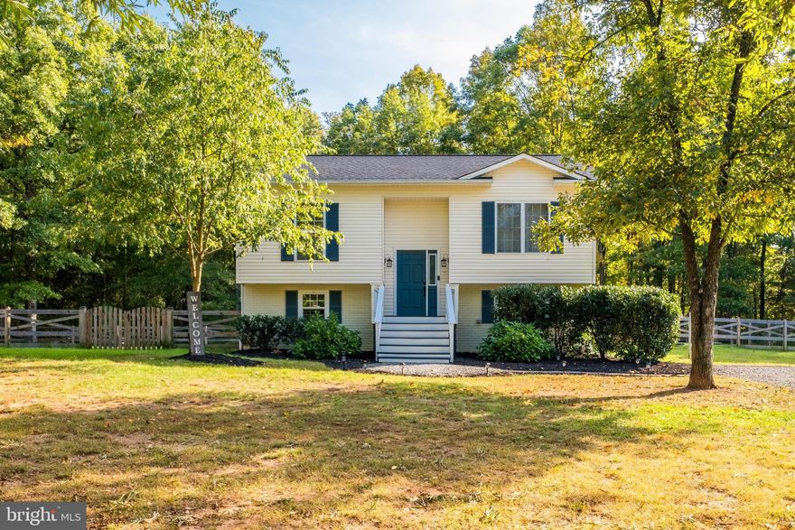 Situated on just over 2.5 acres, this property offers a spacious flat yard, a detached 2-car insulated + heated garage, and a storage shed—ideal for both everyday living and outdoor enjoyment. Completely renovated in 2020 and meticulously maintained, this home impresses with modern finishes and thoughtful updates throughout. The main level features a bright, functional layout with a modern kitchen, designated dining area, and two bedrooms that share a beautifully updated hall bath. The walk-out lower level adds flexible living space with a spacious rec room, laundry area, and a private primary suite complete with an en-suite bath. Step out from the kitchen onto a generous deck—perfect for entertaining or unwinding. This is the home you've been waiting for!