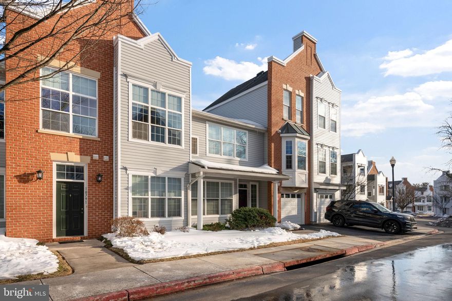 Welcome to this beautifully updated two-story condo offering effortless single-level living in the heart of Columbia. Enter through your private entrance via a graciously long, one-car garage and head upstairs to a bright, open floor plan designed for both comfort, convenience and style.

This home features two spacious bedrooms and two full bathrooms, plus a versatile bonus area off the living room—perfect for a home office, gaming space, or cozy reading nook. The expansive living area is anchored by a gas fireplace and flows seamlessly into the dining space, which is highlighted by a designer chandelier and leads into a kitchen ideal for both everyday living and entertaining.

High ceilings, gleaming hardwood floors, and all-new lighting and ceiling fans create a fresh, modern feel. The newly renovated kitchen shines with 42” white cabinetry, quartz countertops, and GE Profile stainless steel appliances. The laundry room also includes an upgraded GE washer and dryer.

The primary suite is a true retreat, featuring a private sitting room or home office, a large custom closet, and a beautifully renovated en-suite bathroom with a soaking tub and an oversized glass-enclosed tiled shower. For added privacy, the bedrooms are thoughtfully placed on opposite sides of the condo. The second bedroom is generously sized and includes a custom closet with easy access to the second full bath.

Additional upgrades include fresh paint throughout, an insulated garage door with a new app-controlled motor, electronic window treatments, and custom closet systems. These thoughtful, high-end improvements are truly the next owner's gain.

Ideally located near Merriweather Post Pavilion, shopping, dining, spas and indoor/outdoor recreation, this home offers convenient access to major commuter routes including 100, 29, 95, and 32; perfectly blending modern luxuries with an unbeatable location.

A large exterior condo renovation is at the final stage of the project adding the security and confidence of the buildings and the condo association and fees to the new Owner!