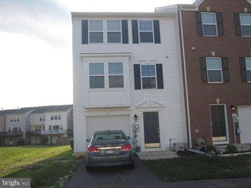 End Unit TH in Popular Manor Park. Ready for you today! Morning Room extension off kitchen. New lighting, pantry,island, new appliances, ceiling fans, fresh paint throughout, new hardwood floors, finished basement with half bath, laminate flooring andgarage has auto opener and storage shelves. Master suite with bumpout, walk in closet and luxury bath with seperate soaking tub. Calltoday!