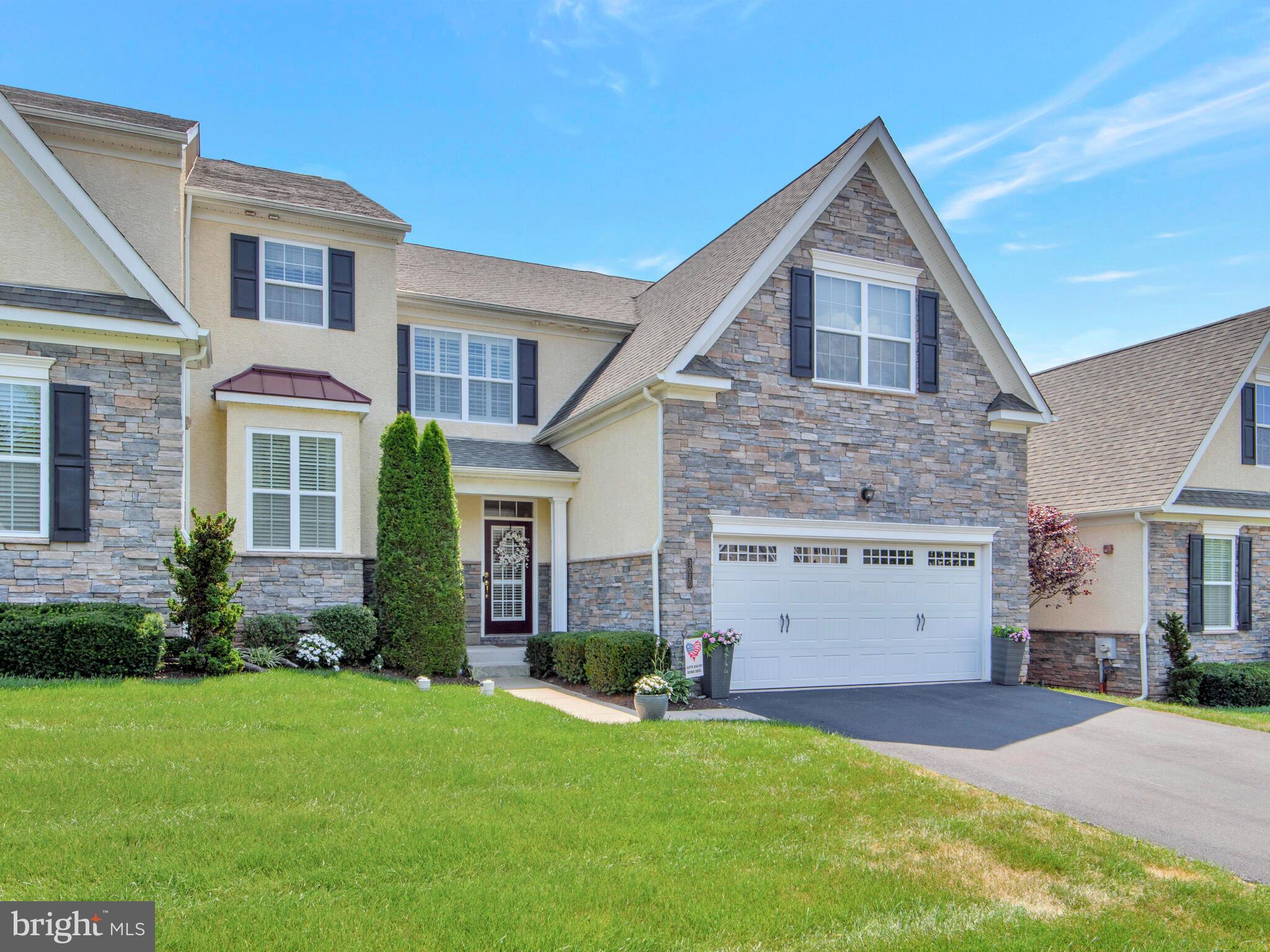 Stunning carriage home situated in the one and only Thorndale Community of Towamencin Township! Thorndale is comprised of 44 acres and is served by the highly sought-after North Penn School District. Inside this gorgeous home are Low-E windows, plantation shutters, illuminated outlets, granite countertops, hardwood floors, and space, plenty of space! The elegant architecture and well thought out floor plan makes this dream home move in ready! On the ground level you will find an office with beautiful glass paneled French Doors, a formal dining room,  an eat in kitchen, a convenient half bath, and a towering great room containing a wall of  windows and soaring 18' ceilings!  Ready for game day or ready to hit the gym? There is a fully finished basement with a gym on one side and an entertaining area equipped with a wet bar on the other side. When the day is done and you’re ready to retire for the night, head on up to the  second floor which is comprised of three bedrooms. One primary bedroom with an en-suite and two additional bedrooms, serviced by a hall bath.  The laundry room is located just steps away from the bedrooms, making this an added bonus to an already amazing home! The outside of this home boasts a two car garage and a huge custom stone patio equipped with a permanent propane line for all of your grilling needs.  If you have been looking for perfection, then here is your opportunity to own it! Don't wait to schedule your appointment to tour this immaculate home!