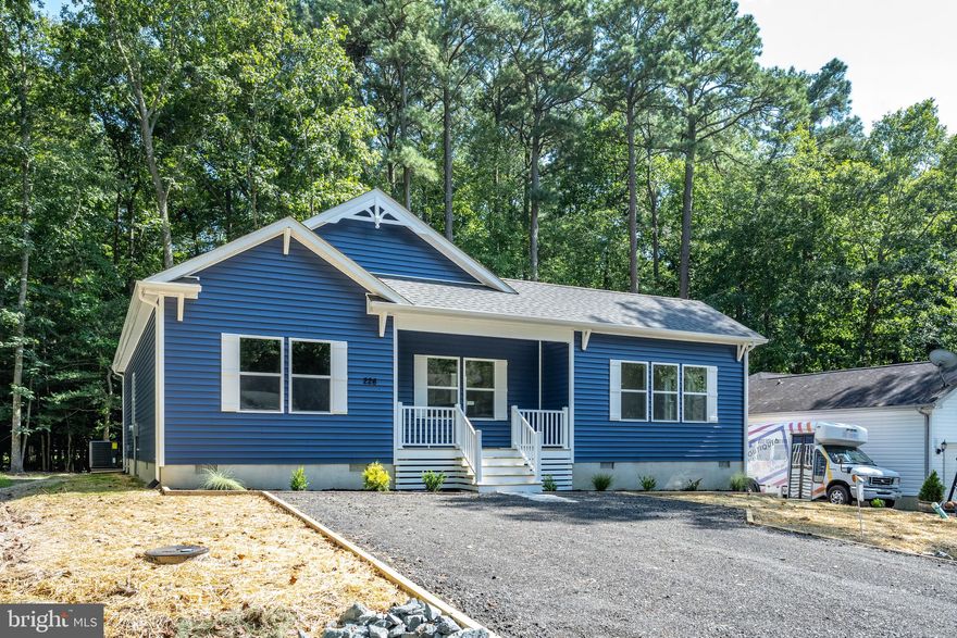 Best Price in Ocean Pines! New Construction, 1800 Square Feet, Very Bright Open Floor Plan, Lots of natural light, Large Spacious Kitchen, Granite Counter Tops,  abundant Cabinets and Pantry, Huge Sunroom with Rear Side Deck, Large Bedrooms, Laundry Room, Built to the New Energy Code with 9 Foot Ceilings, Coastal Windows,  Pull Down stair to attic, Storage Shed Built into Home. Ready for immediate occupancy.