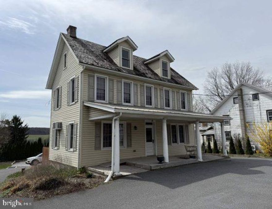1100 square foot 1st floor space, ideal for office, retail, or storage use. Main level entry/exit consists of a full kitchen, three rooms, a half bath and has access to the basement. This unit was at one time a bakery/deli. There is a commercial vent system and fire suppression system in the one room. Large parking lot in the rear of the building. There is a finished second level that is also currently commercial space however it is in the process of getting zoned for residential use.
