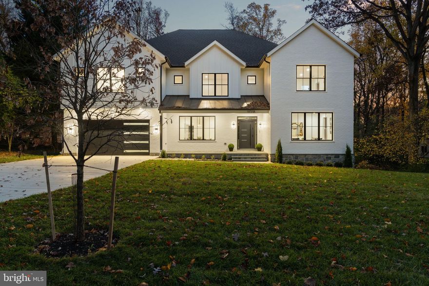 Welcome to your dream home—an extraordinary, custom-built luxury estate where elegance, comfort, and modern design converge. This remarkable residence boasts 6 expansive bedrooms, 6 full bathrooms, and 2 elegant half baths, thoughtfully designed to provide both family functionality and refined entertaining. From the moment you enter, you’ll be captivated by open-concept living and dining areas. Oversized windows flood the home with natural light, while seamless flow makes these spaces perfect for hosting everything from intimate dinners to large-scale gatherings. A private study/office offers the ideal retreat for remote work, reading, or quiet reflection. At the heart of the home is a gourmet kitchen that will delight any culinary enthusiast. Outfitted with top-of-the-line appliances, dual center islands, bespoke cabinetry, and a built-in wine fridge/cellar, this kitchen is as functional as it is stunning—a true showpiece where meals and memories are made. Every bathroom throughout the home is designed as a spa-like retreat, showcasing designer tilework, premium fixtures, and meticulous craftsmanship. Each space has been curated to provide daily indulgence and comfort. The fully finished basement elevates the home’s versatility. Featuring a stylish wet bar, additional bedroom, 1.5 bathrooms, and a custom wine cellar, this level is perfectly suited for hosting guests or enjoying movie nights, game days, and private celebrations in an upscale atmosphere. Step outside to your own private oasis. The backyard is tailored for resort-style living, complete with a built-in grill, fire pit, and lush landscaping. Whether entertaining friends or unwinding under the stars, this space offers the perfect balance of relaxation and sophistication.
Situated just minutes from Cabin John Village and Pike & Rose, residents will enjoy easy access to premier dining, boutique shopping, and vibrant entertainment options. This exceptional location provides a lifestyle that is both convenient and exclusive.