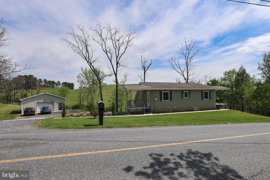 Beautiful 3 Bedroom, 2 Bathroom Home in Pine Grove w/ Garage.  Enjoy quiet country living in this wonderfully done home!  Home includes ground floor master bedroom, multi zone heat system w/ AC & spiral staircase.  Entertain guests with plenty of parking, large yard and deck area.  Garage includes workshop area, electric subpanel and plenty of storage. Call today for a showing!