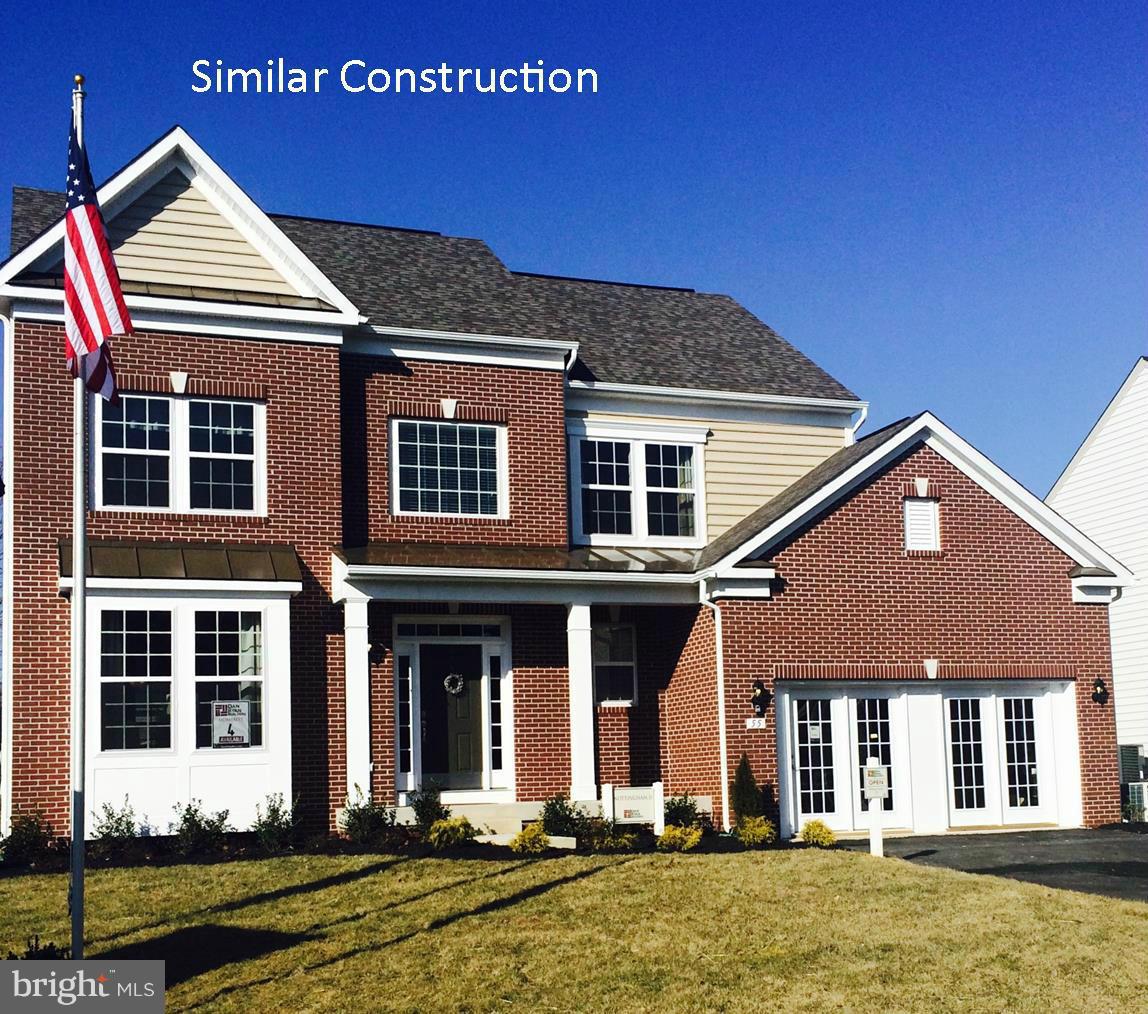 Dan Ryan Builders Nottingham II with brick front, 4bedrooms, 2 1/2 baths, 2x6 construction, 2' rear extension & Morning room with cathedral ceiling, formal living/dining rooms, island kitchen with granite tops & stainless appliances, master suite with deluxe bath, tray ceiling, hardwood in dining/kitchen/breakfast/foyer, unfinished basement.