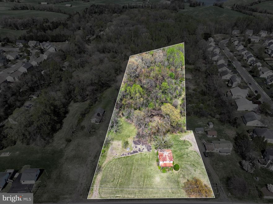 5.03-acre lot in the Town of Culpeper, The old home on the property is being sold AS-IS, PLEASE DO NOT ATTEMPT TO ENTER THE HOUSE. The value is in the land. This listing includes lot 2 (4.7 acres) and lot 3 (.33 acres)