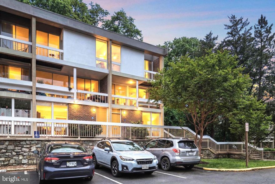 ***Rare Contemporary End-Unit Townhome Near Lake-Anne -- Walkable Reston Living at its Best*** 

Rare opportunity to own a unique contemporary townhome in Reston, ideally located just steps from Lake Anne. Enjoy the convenience of walking to the lake, restaurants, and shops, with Reston Town Center and the Metro approximately one mile away. The location also offers easy access to Dulles Airport, Reagan National Airport, the Dulles Toll Road, and Route 7.
Originally built in the 1960s, these distinctive contemporary townhomes feature a unique and open floor plan. The main level includes a kitchen with breakfast area, full bathroom, laundry room, and a large storage space.
The first upper level opens to a spacious living area filled with natural light. This end-unit townhouse features a boxed bay window, large windows at both the front and rear, and sliding glass doors that lead to a private patio and fenced yard backing to trees. Beautiful hardwood floors and a striking wood accent wall enhance the space.
The kitchen and bathrooms were renovated in 2018, hardwood floors were updated in 2019, the roof was replaced in 2020, the hot water heater in 2022, and the HVAC system was updated in 2025.
The second upper level offers three bedrooms. Two bedrooms are located at the front of the home and share access to a balcony. The spacious primary bedroom spans the full width of the rear of the home and overlooks peaceful wooded views. The bathroom, renovated in 2018, features a walk-in shower and contemporary finishes.
Updated, spacious, and architecturally distinctive, this home offers a rare opportunity to enjoy a modern open layout in one of Reston’s most desirable and walkable locations.  PARKING:  Only park in the NUMBERED parking spaces - Please do NOT park in "Reserved" parking spaces.