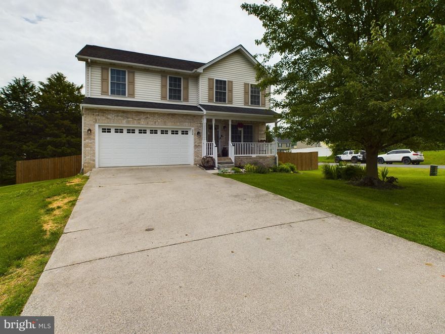 Welcome to your dream home in the heart of Inwood, WV! This immaculate property offers everything you've been searching for and more.

Situated on a spacious corner lot, this charming residence boasts 4 bedrooms and 2.5 baths, providing ample space for comfortable living. As you step inside, you'll be greeted by an abundance of natural light, a gas fireplace and a traditional style floor plan, perfect for both entertaining guests and cozy family nights.

The kitchen is a chef's delight, featuring modern appliances, plenty of counter space, and sleek cabinetry for all your culinary adventures. Adjacent to the kitchen, you'll find a separate dining area, ideal for enjoying your morning coffee or casual meals with loved ones.

Escape to the luxurious master suite, complete with a walk-in closet and a spa-like en-suite bathroom, offering a tranquil retreat after a long day. Three additional bedrooms provide plenty of space for family members or guests, each offering comfort and privacy. 

Outside, the privacy fenced-in rear yard provides the perfect setting for outdoor gatherings, summer BBQs, or simply unwinding in your own private oasis. The two-car attached garage offers convenience and additional storage space for all your belongings.

For those seeking extra space, the partially finished basement offers endless possibilities, whether you envision a home gym, media room, bonus room, bedroom or home office.

Located in the Inwood Meadows neighborhood, this home offers the perfect blend of tranquility and convenience, with easy access to shopping, dining, schools, and major commuter routes.

Don't miss your chance to make this stunning property your own – schedule a showing today and experience the epitome of modern living in South Berkeley County!

Virtual Tour Available.