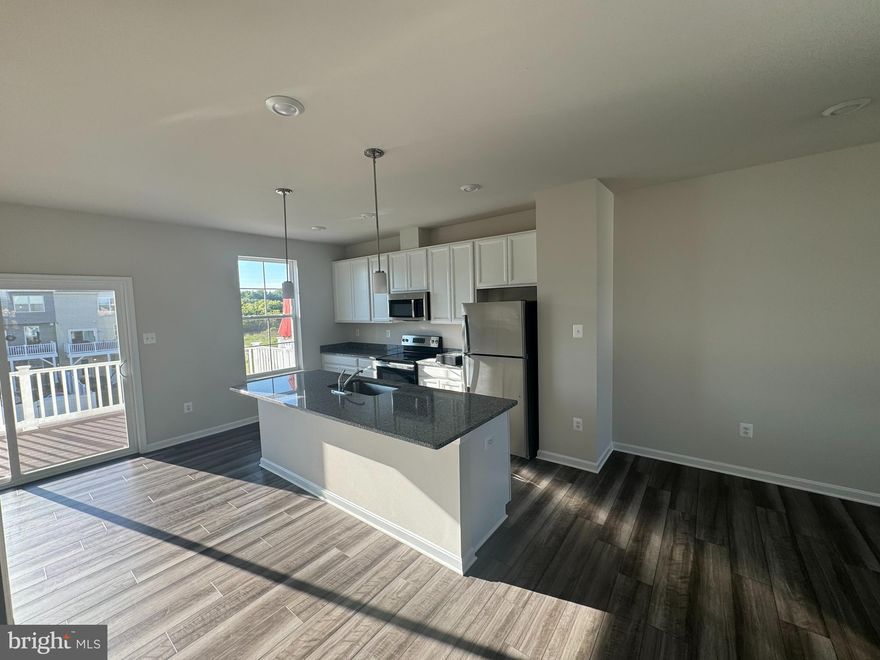 Welcome to luxury and convenience! This new 3-level townhome in sought-after Norborne Glebe offers a spacious and smart design. The lower level boasts a finished rec room, while the beautiful kitchen features stainless steel appliances and elegant granite countertops. With a 1-car garage, washer/dryer package, and a spacious deck, this home has it all. Embrace modern living with smart home features, making life easier and more comfortable. Don't miss the chance to call this townhome yours!