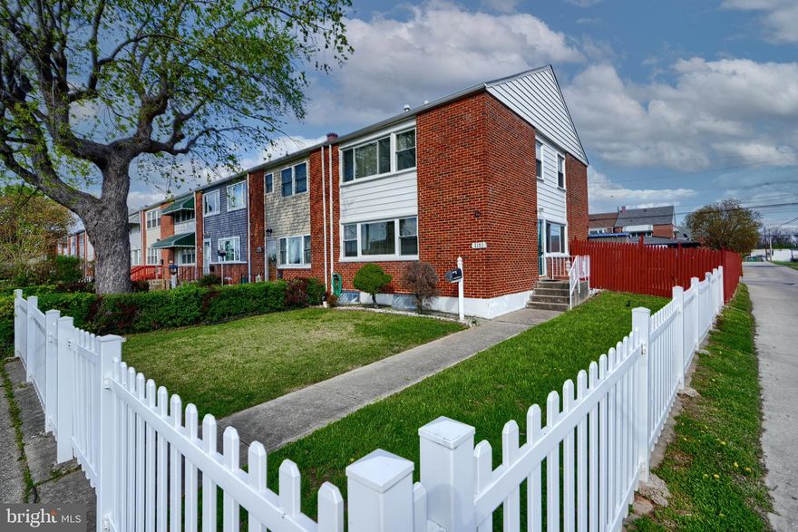 Rare opportunity to own a gorgeous 3+BR/1.5Ba End of Group Townhouse right across from Patapsco High!

Open floor plan boasts extra large eat-in Kitchen with expanded counter and cabinet space and pantry. 
Gleaming hardwood floors and ceiling fans in Living Room and 3 Bedrooms. 
Lots of natural light! Attic has pull-down stairs for more storage. Finished basement has Family room, Office, 1/2 Bath and Laundry area plus more storage space. Walk out stairs to exterior.

Outside, enjoy the spacious deck, fully fenced-in oversized front AND back yards with 2 storage sheds. PLUS RARE PRIVATE parking pad for 2 cars!