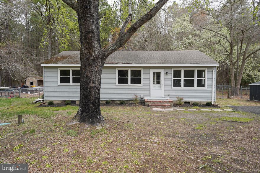 Adorable 3BR/1BA rancher has been updated with new flooring, paint, and kitchen appliances. Great location with a country feel, yet centrally located to everything the Eastern Shore has to offer - from sandy beaches to rivers and bays - unique arts, culture, history, and events - shopping, dining, wineries - sports, fishing, and more. Just 7mi to Downtown Salisbury, 12mi to Historic Downtown Snow Hill, 20mi to one of America's Coolest Small Towns, Berlin, 30mi to Ocean City! Nice-sized living room with new carpet, triple windows for tons of light. Kitchen/dining combo - LVP flooring, granite counters, crisp white cabinetry, stainless steel appliances, sliders to the large deck overlooking your expansive yard, backing to trees. Primary bedroom has 2 closets, new carpet. 2 additional bedrooms w/new carpet. Full bath w/tub/shower combo, tile floor. Utility room w/LVP flooring, washer/dryer hook-ups completes the home's interior. Owners are licensed realtors. Sizes, taxes, distances are approximate