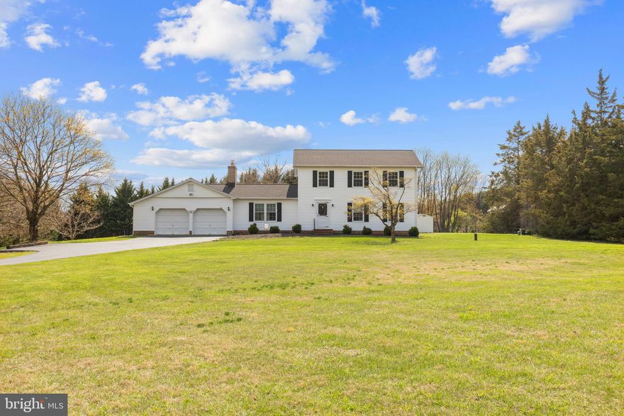 Well cared for Colonial with two car garage located on over two acre lot.  This home features four bedrooms with new carpet and two baths on the upper level. Primary bedroom with full bath and walk in closet. Main level  has gleaming wood floors and includes formal dining room with crown molding and chair rail, living room, laundry area, sunroom and family room with brick fireplace and beamed ceiling.  Finished lower level with walk up stairs and storage/utility room. This home is truly turn key with roof, siding and HVAC all less than 3 years old!  Welcome Home