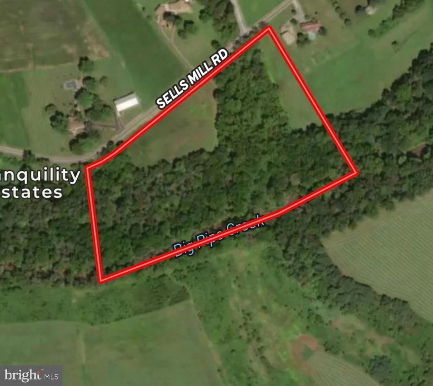 The Sells Mills Road property is a beautiful 13 acre lot a few miles south of Taneytown in Carroll County, Maryland. The lot is a little more than 50% wooded and backs to Big Pipe Creek. It has the ability to be subdivided but has not been perc tested. Excellent opportunity to build your dream house in a country setting that will allow you to take full advantage of the opportunities the property provides. This property is set up for just about any outdoor recreational activity, and some farming if you like. Hunt and fish in your backyard.