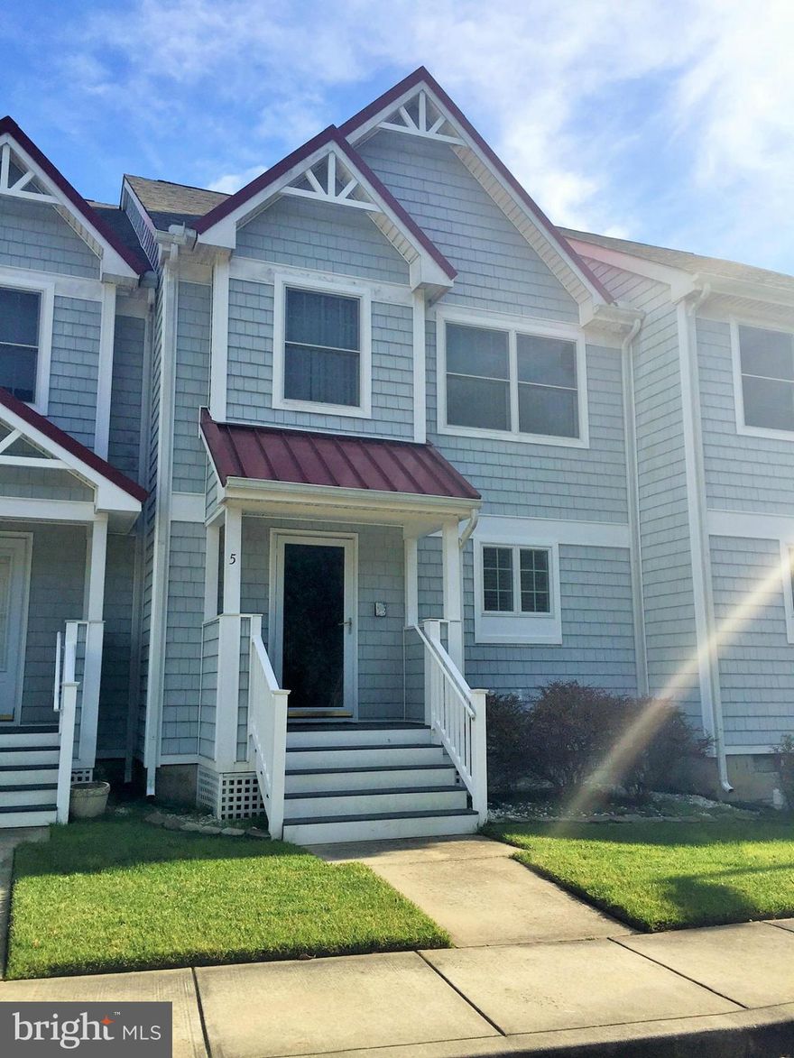 Beautiful town home in popular Ocean Village neighborhood. The living level features a large open kitchen, dining area, living room w/ fireplace, half bath & large private deck that leads down to great backyard space. Large deck off Master! This well run community offers a great amenity package w/ both indoor & outdoor pools, playground, tennis, stocked ponds, fitness gym, & banquet/meeting room.