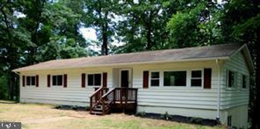 *** BEAUTIFUL SETTING IN HIGHLY DESIRED AREA*** This home may need some TLC, but is READY for you to call it home! Home is being sold strictly as-is. WELL below market value, so you can make it your own!!