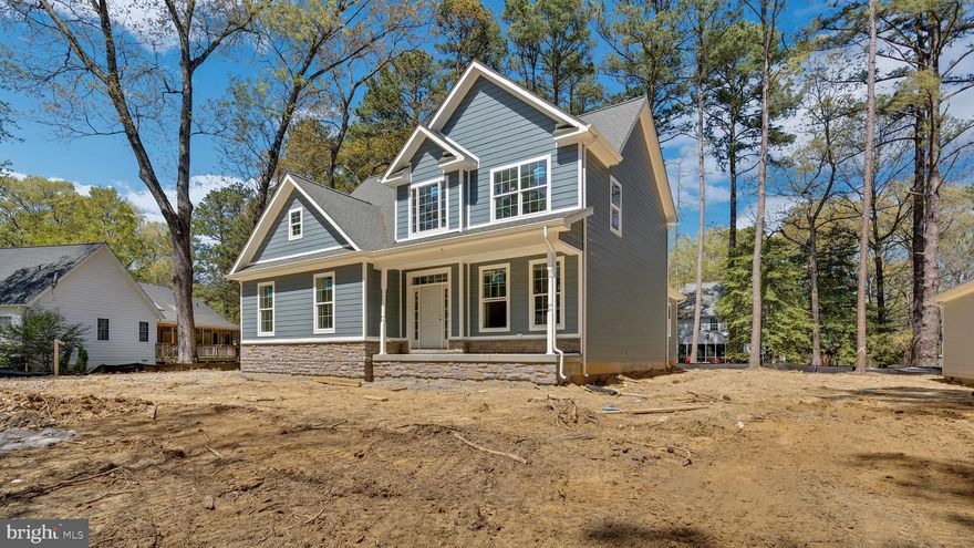 A stunning new colonial home in Swan Point complete  in less then 60 days . Beautiful open floor plan, upgraded flooring, granite & stainless in kitchen, huge conditioned crawl space and much more.  Move in your new home  and enjoy the beautiful afternoon sun coming through the tall pines warms the home nicely. Located in a cul-de-sac offering some privacy and seclusion. Swan Point community amenities include golfing, swimming, marina membership available, riverfront park, restaurant, and clubhouse. This is a great opportunity. must see! The The Wade Built by Kings Creek Homes