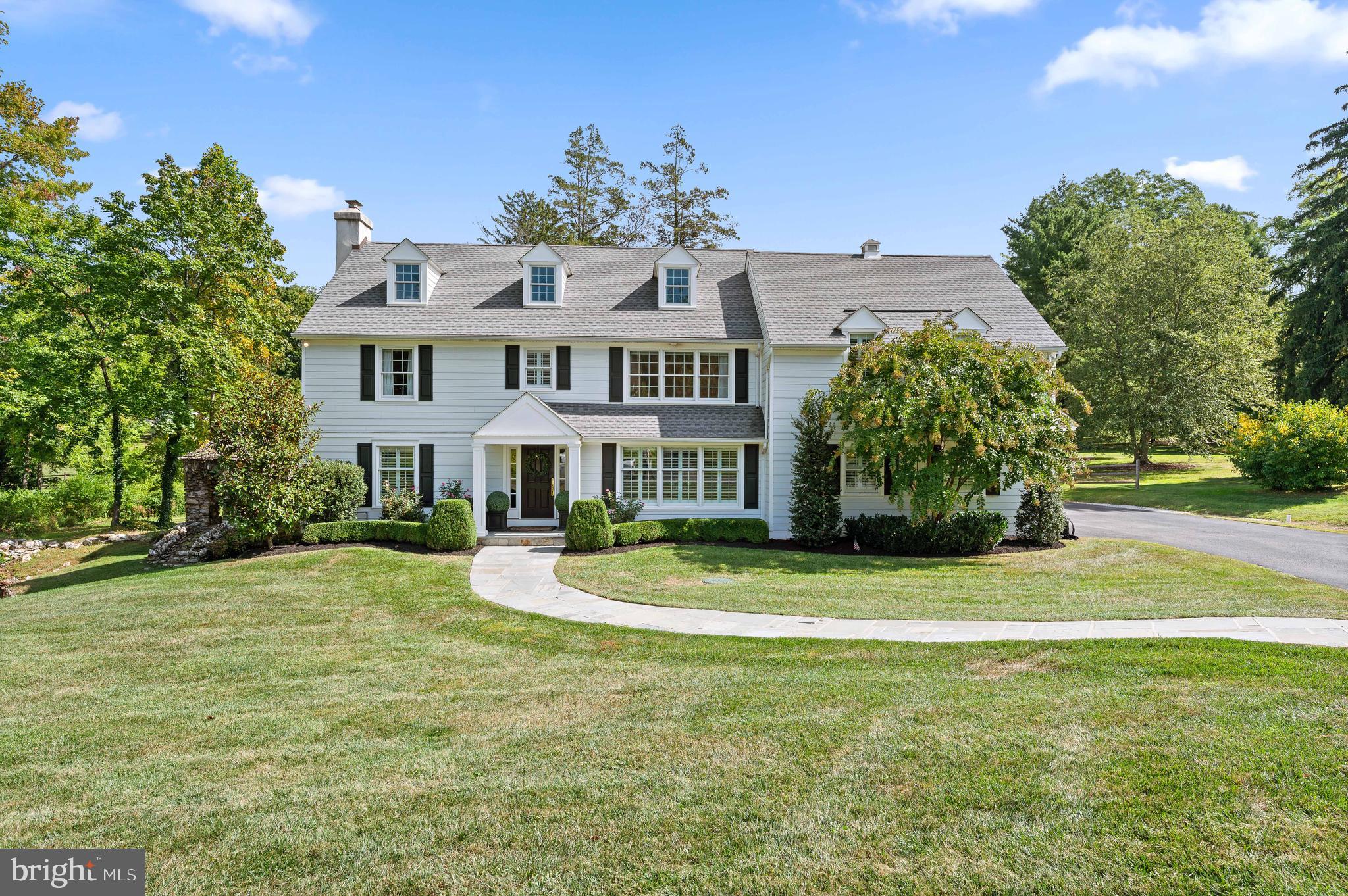 Purchased in 2016 and transformed into a true masterpiece in 2017, 471 Glenmary Lane, is a rare find—offering a like-new property in the heart of an established and highly sought-after neighborhood. Custom designed by renowned architect Warren Claytor, this home effortlessly combines timeless elegance with contemporary design. Gracefully nestled on over one acre in the prestigious North Wayne neighborhood of St. David's , it boasts a storybook setting with a stone gazebo and bridge from the original estate, enhancing its enchanting atmosphere. From the moment you open the front door, your heart is captured as the gracious Foyer welcomes and the sunny disposition of this home radiates. The First Floor offers both formal Living Room with charming fireplace and Dining Room, with gleaming hardwood floors seamlessly connecting to the informal rooms of the home to create a perfect flow perfect for modern living. The gourmet Kitchen is a chef’s dream, featuring a massive island, quartz countertops, two sinks and dishwashers, stainless steel appliances, and so much more. It overlooks the fully fenced-in backyard oasis and is flanked by family-friendly spaces, including the most adorable playroom you have ever seen. It also includes a convenient mudroom off of the 2-car Garage, along with a charming Powder Room, adding to the home’s functionality. The Second Floor features 5 spacious Bedrooms all with hardwood floors, and 3 full Baths, including a magnificent private Primary Bedroom Suite with a tray ceiling, an exquisite Bathroom, and separate his and her closets fit for a king and queen. The Secondary Baths are equally gorgeous, featuring double vanities and marble flooring, ensuring luxury and comfort throughout. With over 4,500 square feet of luxuriously finished space and finishes , the home offers endless opportunities to expand, including the potential to finish the Lower Level and walk-up Third Floor. Ideally located, this home is within walking distance to the vibrant town of Wayne, while also offering the privacy and charm of its serene setting—Don't miss this true gem in the heart of one of Radnor Townships most prized neighborhoods!! SHOWINGS START THURSDAY SEPTEMBER 26TH at 10:30 am.