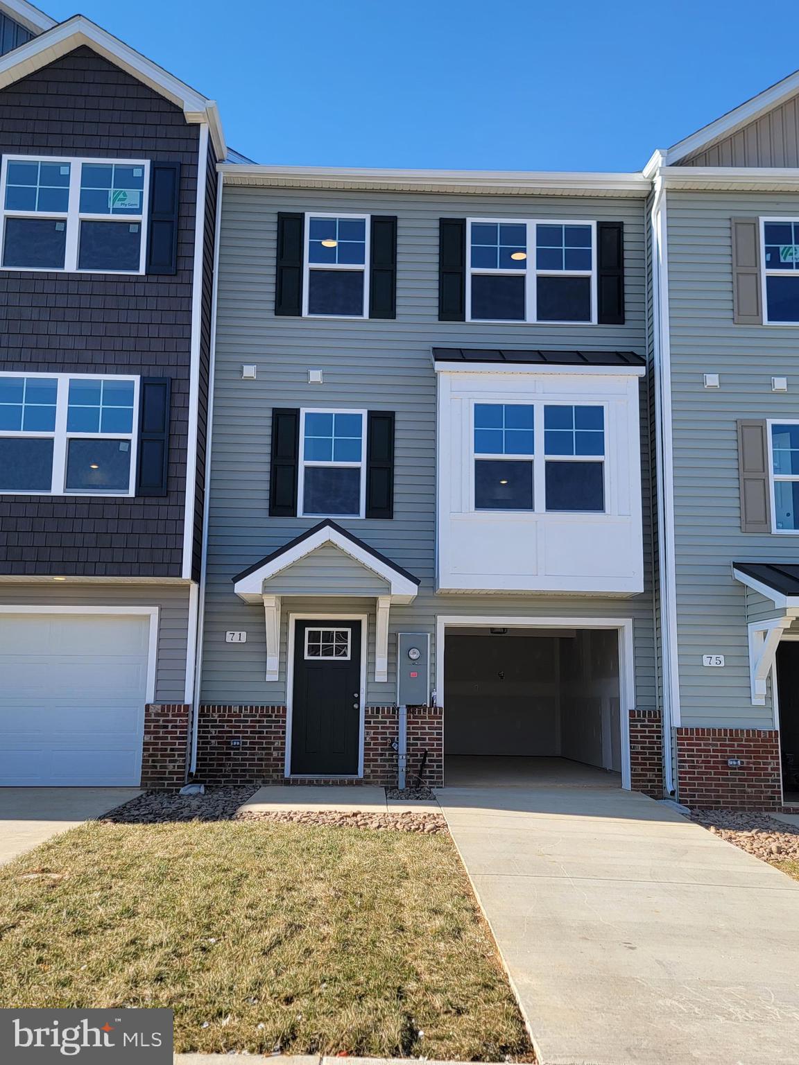 Last 4 bedroom, 3.5 bath garage townhome left!!! Under construction with December delivery! Choose your interior cabinet colors now!!
YOUR FIRST YEARS POWER BILL IS ON US!!!! Up to $10,000 closing cost assistance!!!
The Berkeley II Garage townhome is a 4 bedroom, 3.5 bath garage townhome has an open concept design on the main floor w/ a kitchen island with granite top, 42" cabinets, a high low peninsula with granite top for entertaining, stainless-steel appliances, a large living room w/ a bump out and a half bath. The upper level features a large primary bedroom w/ cathedral ceiling, walk-in closet, double vanity and a walk-in tile shower; two guest bedrooms, full guest bathroom, linen closet and laundry. The lower levels feature a coat closet, foyer, single car garage w/ automatic garage door opener (app enabled also) and fourth bedroom with a full bath w/ door to access to your backyard, this room makes a great recreation room as well. There will be NO homes built behind you here!!! Throughout the home you will find recessed LED's, ceiling fans in the Primary bedroom & living room w/ each additional bedroom pre-wired for ceiling fans. High/Low outlets w/ pass through plates w/ CAT5/COAX/HDMI in Owner's bedroom & living room to make mounting your TV a breeze. You get more for your money with Four Points Construction. We are a featured loaded builder. Winner of WV Best in Class for Energy Efficiency - The Communities of Burwell has done it again! Pictures are of similar construction townhome.
This is under construction. Appointments are required. We will meet at the single-family model home, 59 Jills Way, to do a virtual tour, review plans/pictures & color selections.