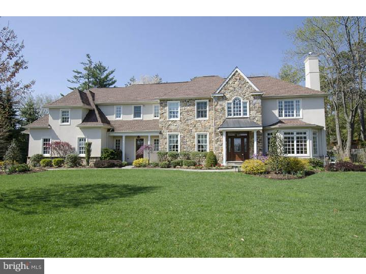Exquisite Stone and Stucco, 5 Bedroom, 4 Full Bath, 3 Powder Room, 6600 Square foot, Manor home which sits on beautifully manicured .85 acre level lot in sought-after Penn Valley. This 2-story, center hall, colonial home features and open floor plan with beautiful oak hardwood floors, crown moldings, wainscoting and a surround sound system throughout the entire first floor. Formal, sunny Living Room with fireplace, Sizeable Dining Room with chair rail, crown moldings and surround sound, cozy Office/Den with custom book shelves and sunny spacious Family Room with vaulted ceilings, fireplace and wonderful views to the oasis-like back yard. Spacious Kitchen offers built-in stainless steel Thermador and Sub-zero appliances, granite counter tops, large island workspace, desk area and recessed lighting. Mud Room with custom built cubbies. Butler's pantry with wine cooler and Breakfast room with high ceilings and French Doors leading to the spectacular fenced-in level rear flagstone patio with built-in barbeque grill which are perfect for entertaining indoors and out. 2nd floor boasts a Master Bedroom Suite complete with Sitting Room, high ceilings, his/her walk-in closets, luxurious his and hers Master Baths with granite double vanities, Jack and Jill tile shower and Jacuzzi tub for quiet and relaxation. 2nd full suite with its own bath, closet, sitting area (perfect for au pair or visiting in-laws).3 more sizeable bedrooms with great walk-in closet space, 2 full spacious baths and Laundry Room complete this level. Finished enormous basement with endless possibilities. Large level fenced-in rear yard with lighting and sprinkler system. Professionally landscaped front yard and sprinkler system. Three-car garage. Award winning Lower Merion Schools. Close to I-76 and minutes to Center City! Unpack and start making memories in this home which is truly in move-in condition. Special financing is available on all properties from Sirva Mortgage, Inc.