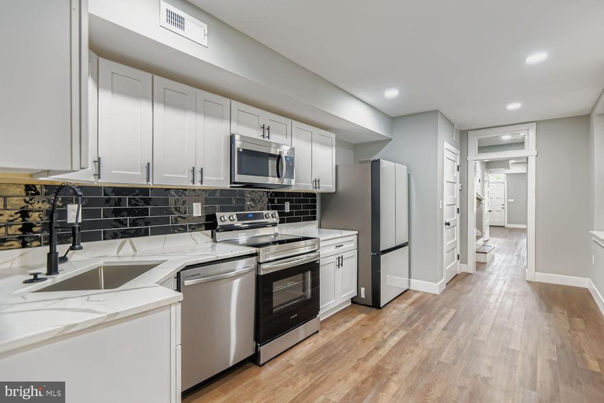 CHAP 10-Year Tax Credit – HUGE SAVINGS FOR BUYERS!!!
Welcome to 1409 E Eager Street, a fully renovated 4-bedroom, 4.5-bath townhome in the heart of Baltimore. This home comes with a 10-year CHAP tax credit, offering incredible long-term savings and making homeownership even more affordable.
Step inside to discover gleaming hardwood floors, designer finishes, a convenient half bath, and a laundry room on the main level. The gourmet kitchen features sleek white cabinets, a black subway tile backsplash, quartz countertops, and stainless steel appliances. Each of the four spacious bedrooms boasts its own en-suite bathroom, complete with custom tilework, matte black fixtures, and modern vanities. Enjoy the privacy of a fenced backyard, perfect for entertaining or relaxing outdoors.
Located near Johns Hopkins, Downtown Baltimore, and major commuter routes, this home combines modern comfort with city convenience.
Don’t miss your chance to own this stylish, move-in-ready home with significant tax savings. Schedule your private tour today!!!