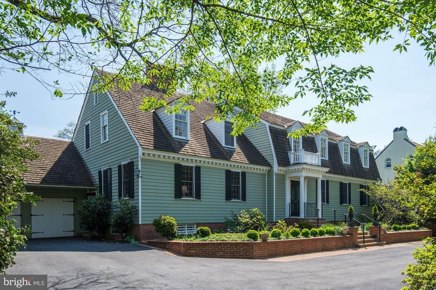 INCREDIBLE PRICE NOW! Sun filled colonial on fabulous block! Entertaining sized rooms. The inside connects with the outside seamlessly. 7 BR/5.5BA, Kit w/ fam rm, den & office, 1st fl master, rec rm. Screen porch, terrace, fountain, magnificent, large landscaped yd w/ heated pool. Walk to METRO