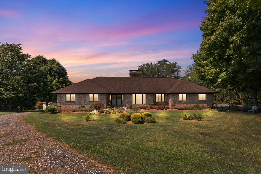 Nestled on almost 10 acres of sprawling land, this expansive rancher offers the perfect blend of tranquility and potential. The home itself has 2 spacious levels  with stunning views of the surrounding landscape. Kitchen has custom Keener cabinets,  granite & stainless steel appliances. Fully finished lower level with additional bedroom, full bathroom & kitchen provide multiple living areas. Two pellet stoves provide an alternate energy efficient heat source! Outside, the possibilities are endless! There’s ample space for horses, livestock, or even a private vineyard. The gently rolling terrain and mature trees create a peaceful setting, ideal for relaxation or exploring the property’s natural beauty. Detached garage/pole barn  (34'x30' with 30 amp electric & space for RV or boat) added in 2019. Additional updates include: Roof/30+ yr architectural shingles (2014), HWH's (2022 & 2024), washer/dryer (2024), wall oven (2024), well pump & pressure tank replaced within last 5 years.