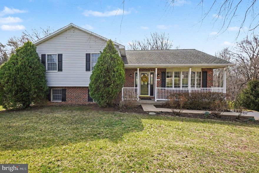 COMPLETELY turn-key! Situated on 1.35 acres on a quiet cul de sac, beautifully maintained 4-bedroom, 2 full bath split level offering 2,178 sq. ft. of finished living space and located in the sought-after water-oriented community of Woodcrest Shores with close proximity to Rt 40, I-95 and Harford County. Main level highlights include a living room with beautiful hardwood flooring and a bay window, kitchen and formal dining room featuring French doors leading to a 16' X 22' screened-in porch, ideal for entertaining! Kitchen details include stainless steel appliances, laminate flooring, Corian countertops, propane cooking and plenty of cabinetry and prep space. Upper-level features include 3 bedrooms, including a primary offering a walk-in closet with dual entry to a full bath. Lower-level details include a family room, fourth bedroom, full bath, laundry and utility room with garage access. Additional property features include a 3-car side entry garage, large gardening shed added in 2020 and attractive, well established seasonal landscaping. Upgrades include a 30-year architectural shingled roof added in 2015, gutter guards (2024), new shutters (2025), well pump (2018) and dishwasher added in 2025 (see full list of improvements in documents). Woodcrest Shores community waterfront features include a sandy beach, swimming, fishing, canoeing/kayaking, picnic area, tot's playground and boat ramp. Additional community details include Triton Marina with boat slips available at varying costs. HOA fees are $50.00 annually, with a one-time fee of $100.00 for new home buyers (see documents for more info). Shows pride of ownership. If you are searching for a move-in ready home located in a peaceful and friendly water-oriented community, your search is over... 72 Cynthia Court... A PERFECT place to call HOME!!!