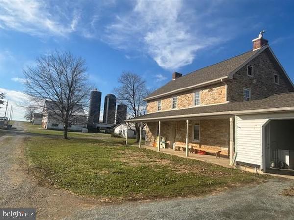 This property will be offered at Public Auction on Thursday, February 15, 2024 @ 1pm. The listing price is the opening bid only and in no way reflects the final sale price. $ 250,000 down due at auction, 2% transfer tax to be paid by the purchaser, real estate taxes prorated. Nestled in Southern Lancaster County, this gorgeous 115-acre Peach Bottom farm boasts approximately 96 acres of tillable land, numerous outbuildings including a modern 40,000 bird layer house that is approximately 80’x690. The other outbuildings consist of an approx. 40’x320’ shop with warehouse, 3-row free stall barn with drive by feeding and auto scrapers, and a bank barn. The 4-bedroom, sandstone farmhouse has some recent updates and includes an attached 2-car garage. Additional amenities include nearly 16 acres of pasture and easy access to Routes 272 and 222. THIS FARM OFFERS SEVERAL GREAT SOURCES OF INCOME, IS IN CLEAN & GREEN, CERTIFIED ORGANIC, AND IS NOT PRESERVED.