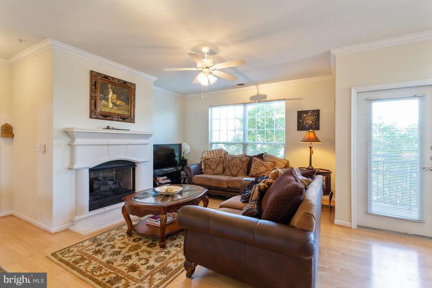 WOW, FULLY FURNISHED SO JUST SETTLE RIGHT IN! LEASE TERMS AS SHORT AS 3 MONTHS AVAILABLE.  Just perfect for the busy working professional or corporate contract professionals.  This corner unit is very roomy and shows beautifully. Located directly next to the stairwell for ease of entry and lots of natural light, this open concept condominium has all the necessities. Bright open spaces, an open concept kitchen, neutral tones, a wrap-around covered deck,a full in-unit laundry room, bonus in-unit storage, large master and large master bath, gleaming bright hardwood floors, stainless steel appliances, modern window treatments, and an oversized walk-in closet. This unit boasts the largest square footage of any 1 bedroom unit in the complex. The metro stop directly outside the complex is near completion. Directly across the street is shopping and other 24 hour amenities such as Harris Teeter. The grounds and amenities are all inclusive, beautiful, and well-maintained.