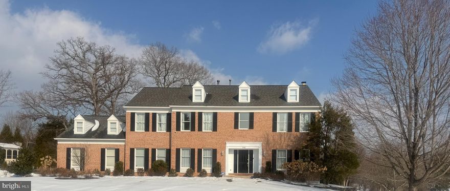 Nestled in the sought-after Hunter Mill Estates, this exceptional nearly 5,000-square-foot residence offers 5 bedrooms, 3.5 baths, and sits on a beautifully landscaped half-acre corner lot. A grand two-story foyer sets the tone, welcoming you into a thoughtfully designed main level featuring formal living and dining rooms, a spacious great room with a wood-burning fireplace, and a gorgeous eat-in kitchen w/vaulted ceiling & skylights. The kitchen is equipped with a gas cooktop, double wall ovens, quartz countertops, and generous cabinetry, and opens seamlessly to a screened porch added in 2020—perfect for extending indoor living outdoors. An expansive deck and patio create an ideal setting for entertaining.

The main level is enriched with refined architectural details, including new wide-plank light oak hardwood floors, elegant dentil molding, wainscoting, high ceilings, and abundant natural light. A dedicated office with built-ins, mudroom, and powder room complete this level.

Upstairs, four generously sized bedrooms include a luxurious primary suite with a private sitting area, walk-in closet, and a spa-inspired ensuite bath renovated in 2022, featuring marble walls, a stunning glass walk-in shower, and a freestanding soaking tub. Three additional bedrooms share a beautifully renovated hall bath.

The walk-out lower level is designed for entertaining and versatility, offering a large recreation room with wet bar, gas fireplace, and direct access to the backyard. A fifth bedroom, full bath, ample storage, and workshop space further enhance the functionality of this level.

Hunter Mill Estates residents enjoy access to nearby walking and biking trails, Meadowlark Botanical Gardens, and the W&OD Trail, along with convenient proximity to Wolf Trap Performing Arts Center, Tysons Corner, Reston Town Center, and Metro access for commuting. Pool memberships are available.

Convenience, comfort, and timeless elegance come together in this remarkable home. Welcome home to Coving Cross Lane.