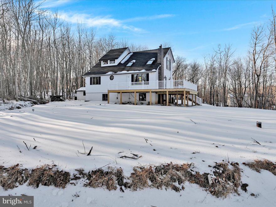 Welcome to this beautifully furnished, spacious 2,500 sq ft home nestled in the scenic Pocono Mountains of Pennsylvania. This home is designed to attract vacationers looking for a cozy mountain retreat. Whether you’re looking for a perfect family getaway or a high-potential Airbnb investment, this property offers it all! With 6 bedrooms and 3 full baths, this property offers plenty of room for family and guests, with each bedroom designed for comfort and relaxation. Turnkey property with stylish and modern furnishings, ready for move-in or rental. Open-concept living areas that seamlessly blend relaxation and entertainment, offering plenty of space for gatherings. With just under 2 acres of land, enjoy privacy and beautiful natural surroundings with ample space for outdoor activities, including barbecues, gardening, or just soaking in the views. Recently installed septic system, ensuring peace of mind and functionality for years to come. A short drive from hiking, skiing, and all that this sought-after destination has to offer.   Modern kitchen with updated appliances, spacious living and dining areas, plenty of outdoor space for relaxation or play. Don’t miss the opportunity to own this incredible home in one of Pennsylvania’s most picturesque and desirable areas. Whether for family use or as a profitable Airbnb, this property is sure to impress!