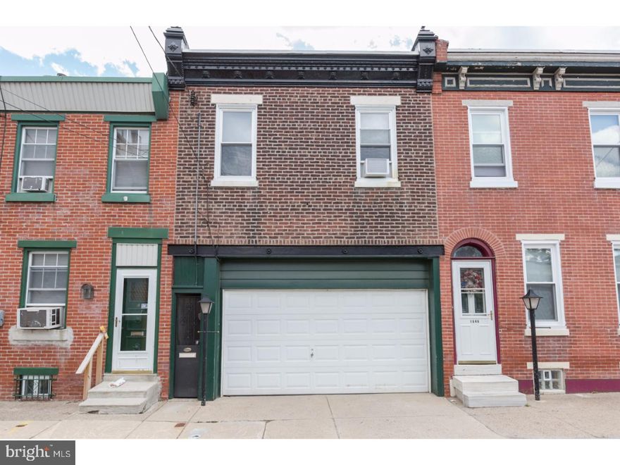 Truly unique 18' wide, 2 bedroom home, with garage on a highly desired block in Fishtown. This 2-story is located in walking distance to all of the action on Frankford Ave and close to the El Stop. With an oversize garage and a side alleyway walk through you have two ways to access the home. The main entrance is through the garage which has a side by side washer and dryer and ample room for a large car and plenty of storage. From the garage walk through to a large flex space with a closet and French doors leading to the living room. This room includes a gas fireplace, wide plank random width natural hardwoods, a skylight, recessed lighting, wall sconces, ceiling fan, and built-in shelving. The 2nd floor has a lovely kitchen with gas range and refrigerator, solid pine cabinetry and there is also a newly renovated bath with soaking tub, ceramic and glass tile and wainscot accents. The master bedroom has a fireplace mantle, 2 sconce lights, plenty of natural light from 2 windows, and parquet flooring and the 2nd bedroom has some of the original windows and door trim which adds a special charm to the room. This home has radiator heat, it has been tastefully repainted, and offers many options for someone interested in living in the hottest part of Fishtown.