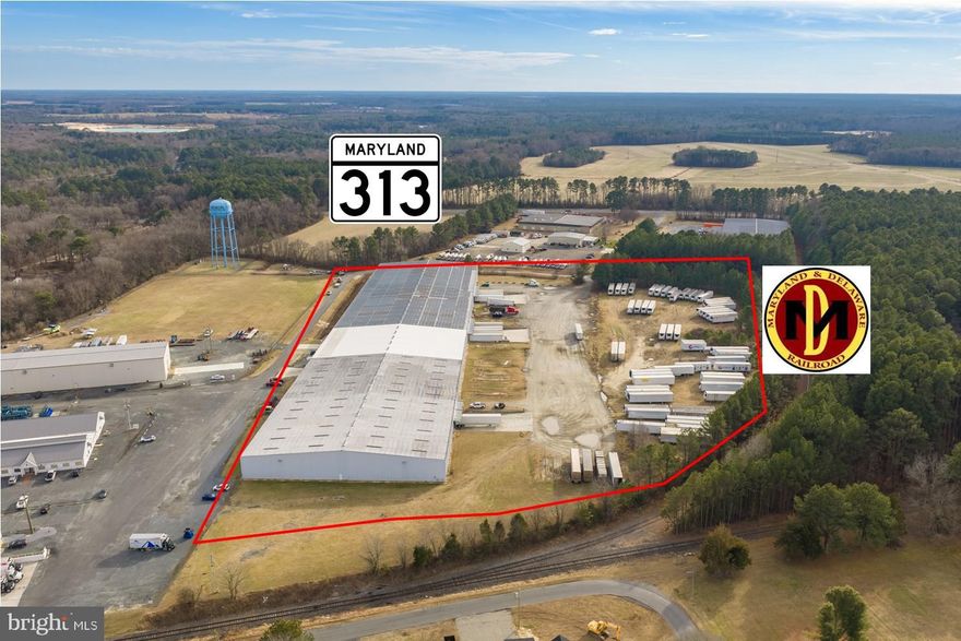 178,000 square foot industrial facility on 15.40 acres.    Ceiling height is 31' at center and 24' at eaves.   16 - 10 x 10 docks (3 pits)  and 2 drive-in doors.   Fully sprinklered with a dry system.  Very flexible layout for single or multiple users.    Several office areas with heat, a/c and restrooms.   Zoned ID2-General Industrial.  

    Situated in the Caroline Industrial Park with access to major transportation routes, including Highways 318 and 404.  This park is equipped with electricity, natural gas, water and sewer, broadband internet access, paved roads and fire and police protection.  Strategic location for distribution and logistics. 

The region is also home to a skilled workforce and a supportive business environment. 

Currently 40% occupied (owner will be vacating the balance).
