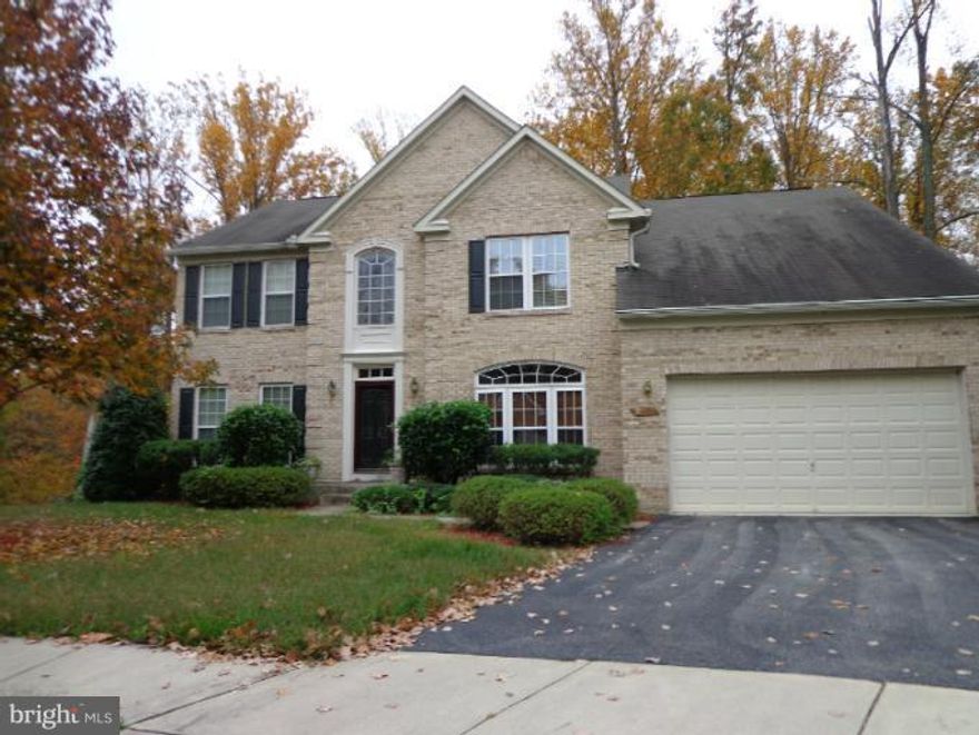 Beautiful colonial backing trees/golf course*2 story foyer*Large eat-in-kitchen w/center island*Sun filled breakfast room leads to private multi-tiered deck w/lighting*Family room w/gas FP off kitchen*Office/library off foyer*2 car garage*Master suite w/tray ceiling/2 walk-in closets/sitting area*2 zoned CAC*Cherry hardwood flrs*fully finished WO basement*See disclosures