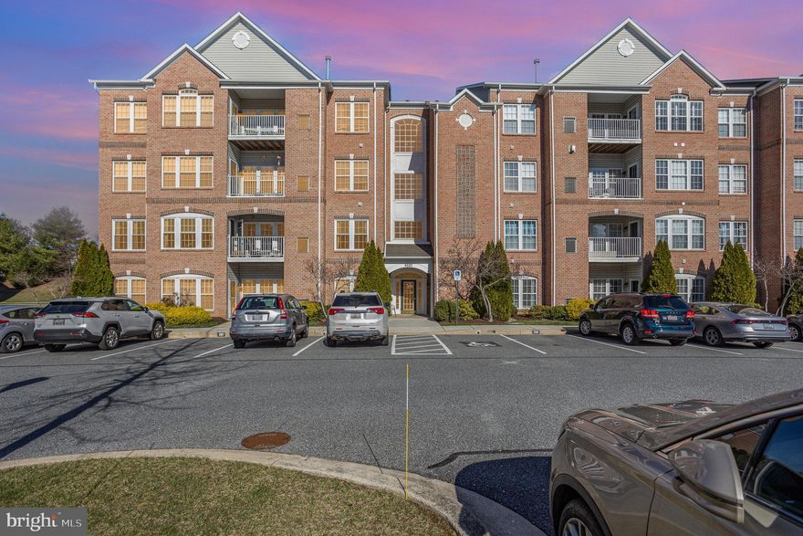 If you have been waiting for the perfect condo in the sought-after community of Windsor at Perry Hall Farms, your wait is over! Step inside and see the value of this stunningly beautiful, well-cared for condo. 
Imagine starting your day – and your car – from the comfort of your bright and cherry breakfast room. With your parking spot just steps away from your private patio you will appreciate the ease and accessibility that living on the ground floor offers. 

As you tour the open floor plan you will notice the many calming and comforting attributes of this home. The neutrally painted walls are pronounced by the white crown molding. Attractive, easy-to-care for LVP flooring flows seamlessly through the living room, separate dining room, kitchen, breakfast/sunroom, both bathrooms, and hallways. Enjoy the warmth of the carpet on your feet as you step out of your comfy beds in the two bedrooms. The kitchen welcomes you to tap into your culinary skills. The unique design of the flat counter space around the sink offers an openness to the adjacent rooms. The granite countertops and backsplash give a sophisticated look, while the 42” cherry cabinets provide additional space for all your kitchen needs. Stainless steel appliances and a pantry complete this delightful area.

The primary bedroom with a large walk-in closet, a cozy area for relaxing, and an ensuite with updated cabinetry, countertops, comfort height toilets, and fixtures will not disappoint. The second bedroom, updated bath, and two closets are located near the front inside entrance of this immaculate home.
Carrier HVAC 2014 and Water Heater 2014.

The community offers well-maintained common areas and walking paths and is conveniently located to shops, restaurants, parks, and much more.

Make an appointment to see this exquisite condo, in a secluded part of the Windsor community, and see for yourself all it has to offer making it an exceptional buy in the current market.

Parking spot is number   313

PLEASE PARK IN SPOT  313    OR ANY UNNUMBERED SPOT.

PLEASE ENTER THROUGH THE PATIO DOOR (NOT THE MAIN FRONT ENTRANCE). SENTRILOCK IS ON THE DOOR HANDLE. THERE IS ONE KEY FOR THE LOWER LOCK.  THANK YOU.