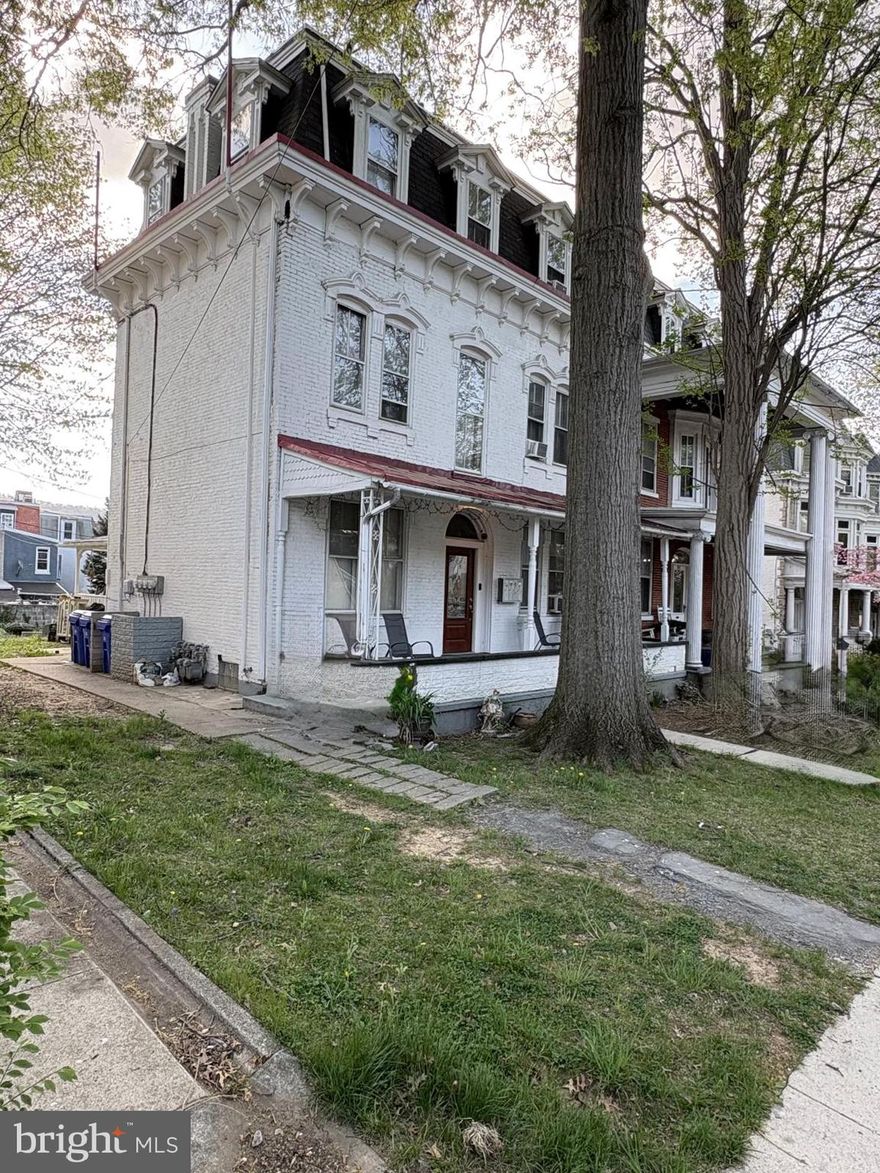 Great location in the Centre Park Historic District 
3 story, 4 unit rental property. Great investor opportunity!