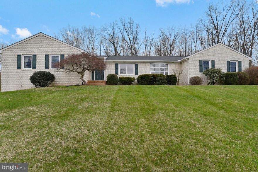 Custom Brick Rambler on 5 Beautiful Acres with Open Floor Plan   Offers 1 Level Living .- New Roof 3/18   3BR'S  2 1/2 Baths Formal  LR & Dr Rooms  Family Rm  w/ Fireplace  off of Kitchen & Sun Room Addition  MBath updated with Walk- in Shower  Hall Bath has Jetted Jacuzzi Tub  - 2 Decks  Over sized  2 Car Garage   Full Unfinished Walk-out Basement   Access to 7 Acre Lake for Fishing  and kayaking