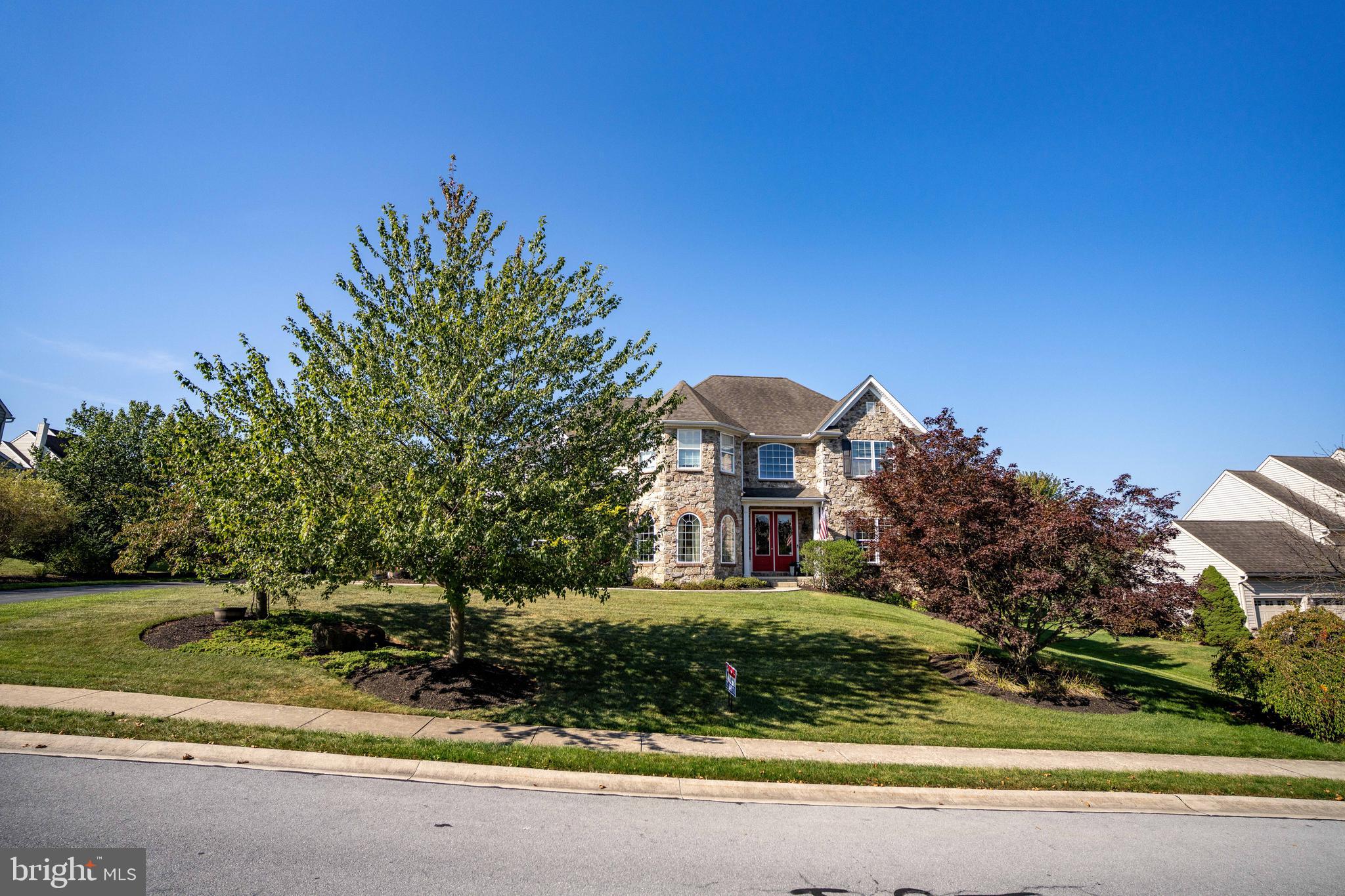 Quality, convenience & comfort are the hallmarks of this executive styled home located in the Hills of Waterford. Commute with ease to Rt 283, PA Turnpike , Rt 83 and more, just minutes away. The traditional floor plan offers a first floor layout with a living room, dining room, family room, den and best of all a separated home office. The lower level finished recreation room also features a full bath and professional styled gym for the Iron Man in all of us. Chefs will appreciate the gourmet kitchen with granite countertops, stainless appliances and a HUGE walk in pantry and combined first floor laundry. The spacious 3 car garage adjoins the pantry so grocery storage is a snap. The fully fenced yard is the perfect host to your K9 friends or children. A spacious 18 X 12 covered deck is just outside the breakfast area including light and a paddle fan. Additional outside entertainment area is just a few steps away, featuring a slate patio and fire pit and pergola seating area. The master bedroom is fit for a King & Queen to enjoy. It features an oversized bedroom & bathroom, with shower and tub. An expansive walk in closet with lots of pull outs is cleverly situated just off the bath area.