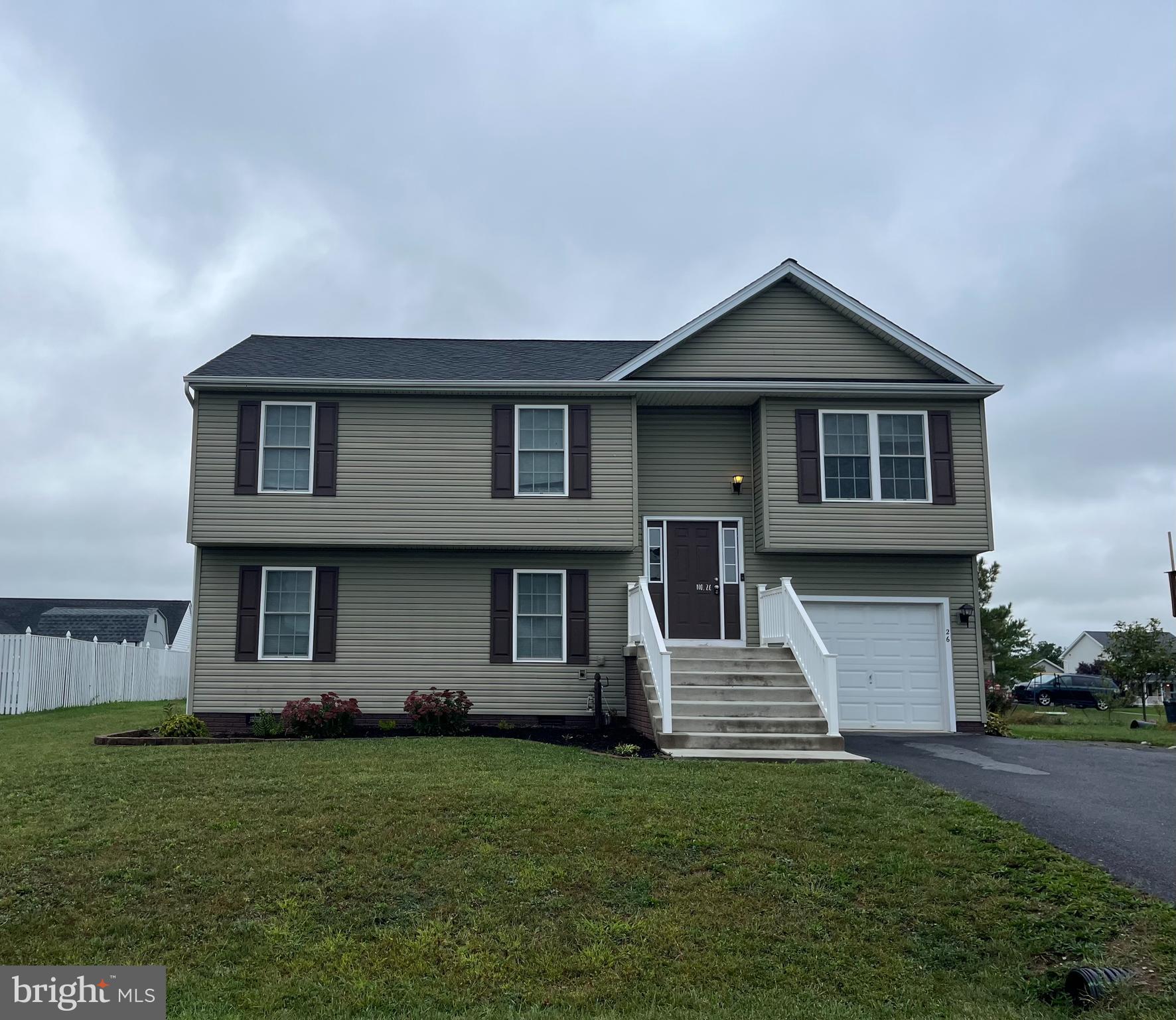 You don't want to miss out on this beautiful home that is move in ready! This is a well-maintained split foyer that features four bedrooms, three full baths, two living areas, and a rear deck with pergola included. Upon entering and heading upstairs you will see the open floor plan including liver room, kitchen, and dining area. Off the dining area is a deck with a view of the spacious backyard. The basement of the home includes a large rec room, another bedroom, full bathroom, and some extra storage space. The garage has been completely finished as well and includes shelving that could be used for a workshop. Schedule your showing today!