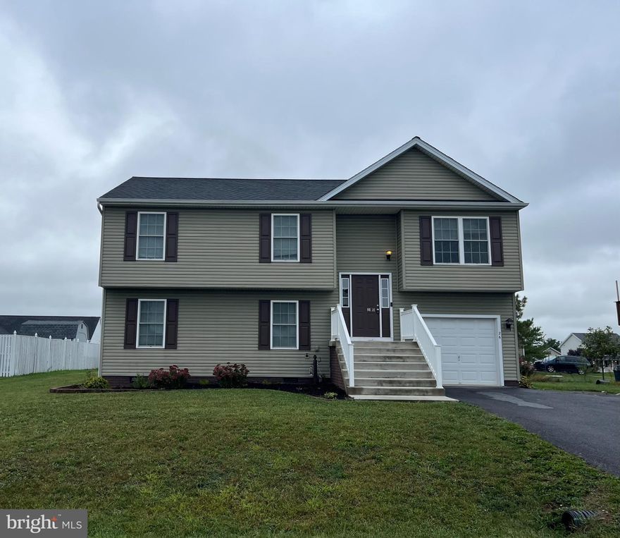 You don't want to miss out on this beautiful home that is move in ready!  This is a well-maintained split foyer that features four bedrooms, three full baths, two living areas, and a rear deck with pergola included.  Upon entering and heading upstairs you will see the open floor plan including liver room, kitchen, and dining area.  Off the dining area is a deck with a view of the spacious backyard.  The basement of the home includes a large rec room, another bedroom,  full bathroom, and some extra storage space.  The garage has been completely finished as well and includes shelving that could be used for a workshop.  Schedule your showing today!