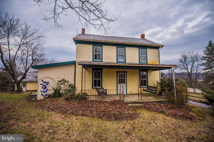 Bring your horses! Farmhouse upgraded with central air, gas furnace & windows on main level replaced. Massive library on main level could be 4th BR.. Fronting a county road, just 1 mile from Berkeley Springs, this property offers 18.73 mostly fenced, rolling acres. Det. 2 car garage, bank barn w/ stalls, pond, chicken coup & most fencing is vinyl. Only 6 restrictions. Listed below appraised price.