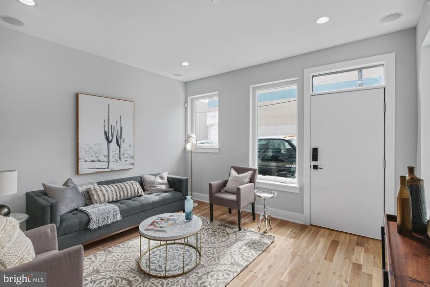 !!HUGE PRICE REDUCTION!! Trenton Mews is a stunning New Construction development in Fishtown located on an extra wide cobblestone street allowing for tremendous natural light to pour into every window. We have corner homes available!! These exquisite homes have 3 outdoor space, a well thought out floor-plan and luxury in every room. Roof decks, master suite terraces and rear yards. The kitchens have Calcutta quartz countertops, pure snow glass tile backsplash, light pendants, Stainless steel appliances and a ton of high quality cabinets. Solid hardwood floors throughout, iron interior railing system and designer porcelain tile choices throughout. The owners suite takes up the entire third floor and has great closet space, a huge spa inspired bathroom with glass shower and double vanity, and door to a 3rd floor outdoor space and stairs to a top roof deck. the guest bedrooms are spacious with closets, hardwood floors and natural light. The 2nd floor bathroom has sleek tile choices and designer fixtures. These great homes also have a finished lower level with natural light and air, a full bathroom, and two bonus rooms that can be used as a 4th bedroom, office, platy room, den, gym or game room. Primo Fishtown location with not one, not two but three outdoor areas and a 10-year tax abatement pending, all at great price.