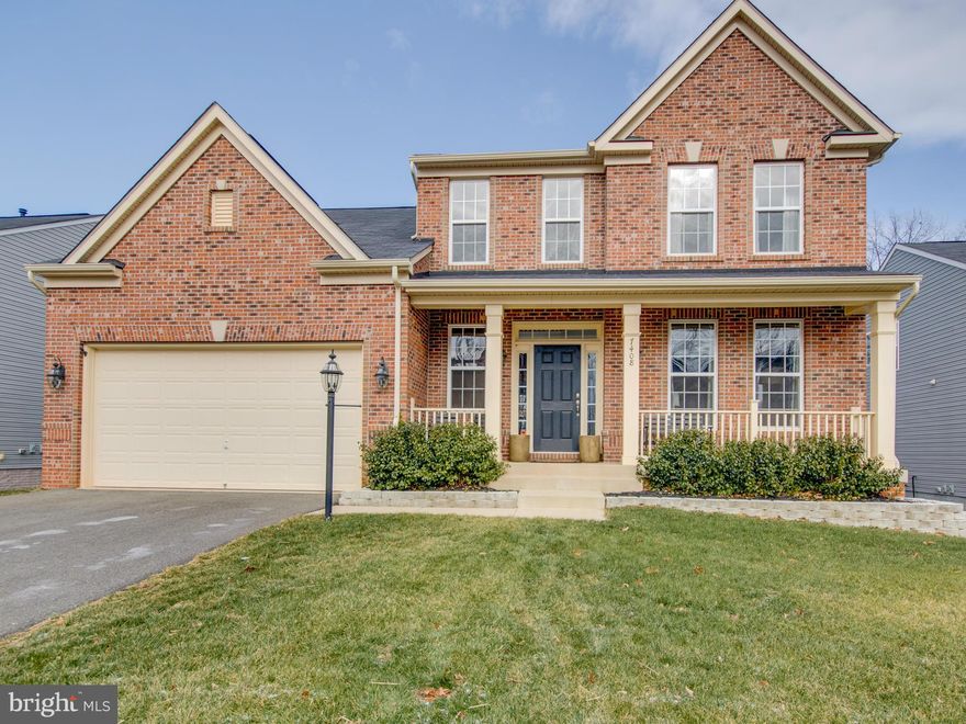 This beautiful Colonial backs to woods with large composite two-level deck and walk out basement. This open layout home includes gourmet kitchen, granite countertops, stainless steel appliances, and hardwood floors on the main level. Large finished basement with theater and bedroom. Four bedrooms upstairs including master suite with tray ceiling and upgraded bath. Home shows like a model.