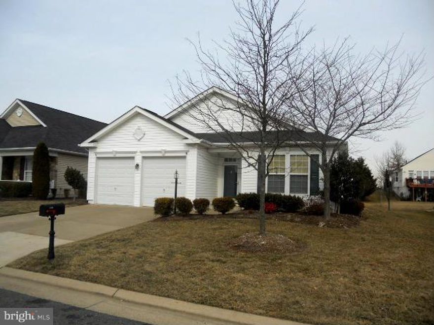 Highly sought -after Sanibel model ( over 2400sf on 1 floor), in 55 or over gated community, 1 mile to 95,mins to Quantico /Potomac Mills/shopping. 9' ceilings, 2 bay windows/screened porch/patio/504 sq ft garage w/service dr. New stainless steel appliances,6' pantry+5' utility closet in kit. Gleaming wood floors, new neutral paint. Master features closet- lovers dream!  Gas heat/super amenities.