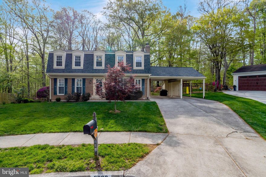 Welcome to 8723 Cuttermill Place, a charming Colonial residence tucked within a desirable Springfield neighborhood. This inviting home blends timeless character with everyday comfort, creating a warm and welcoming setting from the moment you step inside. A cozy fireplace anchors the main living space, offering the perfect backdrop for both relaxing evenings and casual gatherings.

With four well-proportioned bedrooms and two and a half baths on the upper levels, the home provides ample space for both daily living and quiet retreat. The layout is thoughtfully arranged to balance functionality and comfort, making it easy to live and entertain with ease.

The fully finished walkout basement adds exceptional versatility, featuring a private bedroom suite complete with a full bathroom—ideal for guests, extended stays, or additional living space. This level offers endless potential for a recreation area, home office, or a comfortable retreat.

Set on a generous 0.2-acre lot, the property backs to a serene forest, creating a peaceful and private outdoor setting. Whether enjoying quiet mornings or unwinding at the end of the day, the natural backdrop enhances the sense of tranquility.

An attached carport provides convenient covered parking, with additional off-street parking for guests. Ideally located near parks, schools, shopping, and commuter routes, this home offers both comfort and convenience.

A wonderful opportunity to own a classic Colonial in a well-established, peaceful community.