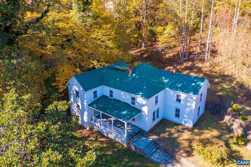 Stay in your adorable, refinished 1 BR, 1 BA cottage while restoring "The Lea House" to it's original spendor. The potential here is endless. Located in Massies Mill, just a stroll away from the Tye River, is this stunning, 3256 sq. ft., majestic, 1890 Virginia Farmhouse. It will need a total rehab but still retains the hardwood flooring in much of the house as well as some handsome woodwork. The roof is new as well as the windows. There is an engineered septic system for 5 bedrooms and a very prolific well. The stonewalls and hardscaping are absolutely unparalleled. There are 5 +/- acres with a fenced area for the "farm goats" and an idyllic garden spot down by the stream with cistern watering available. The yard is graced with lots of mature trees and plantings and towered over by the large, elegant magnolia in front of the home. Firefly fiber optic internet is in place. Minutes to some of the counties best orchards, Tye River fishing, Crabtree Falls and the AT for outstanding hiking. Short jaunts to world class breweries, cideries, wineries and distilleries. And Wintergreen Resort is just up the road for skiing, golf and tennis. A one of a kind offering to restore to it's former glory and make yours!,Wood Cabinets