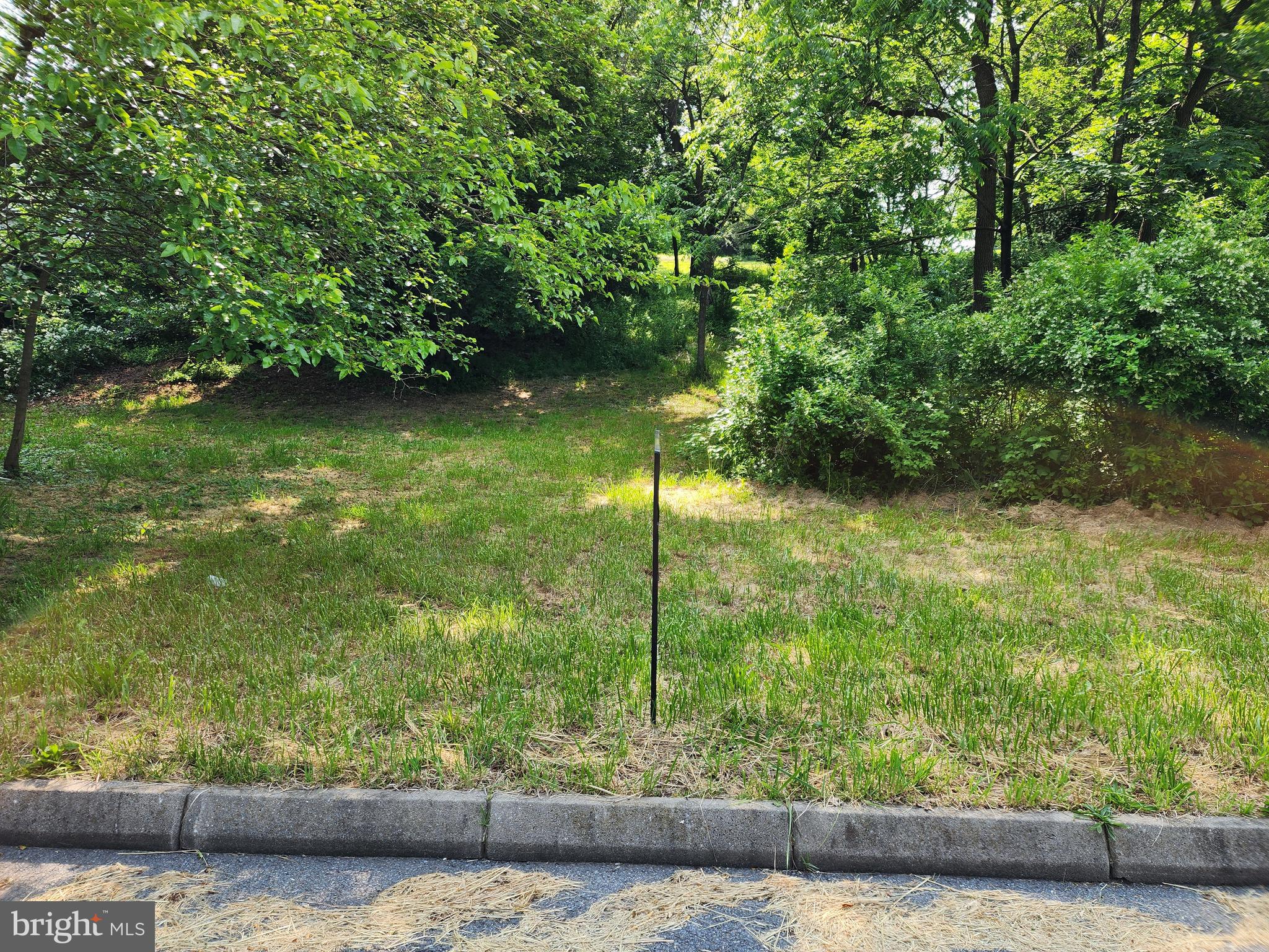 Vacant lot within the City of Cumberland, close to the city park and public pool. Public utilities a curbside, Bring your building plans!