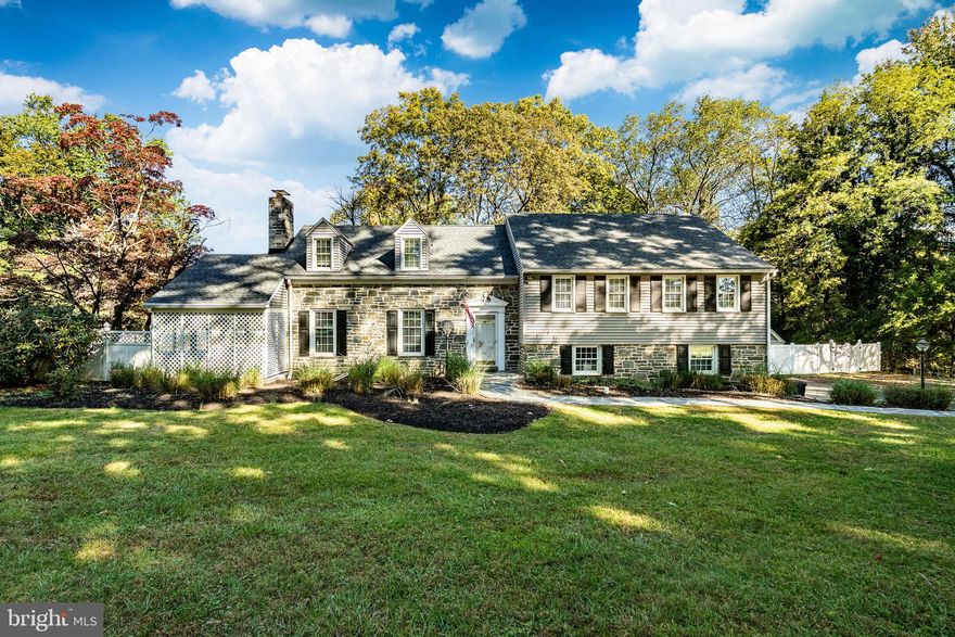 Location, Privacy, Grandeur. This one-of-a-kind open custom property has it all. It's close to everything Wayne and KOP offers.  This large split level single home stands out before you even enter via its appealing stone front elevation and paver walkway leading to the front door.  The beautiful grounds offer a level 1+ acre  lot with desirable features such as an in ground pool, fenced in yard, and enormous deck just inviting recreation and entertaining.  The well maintained home boasts over 3,100 sq ft of living with 5 generous bedrooms and 3.5 baths. The split level living design comes packed with all the perks that are lost in ordinary new build neighborhoods. Throughout the home, you will see quality at its best.  You'll enjoy gleaming hardwood floors and new carpet throughout the house along with fresh paint around each corner.  Each room displays details and upgraded trimming that complement the home’s traditional character. You’ll love cooking in your newly updated kitchen which features crisp white cabinetry with raised panel doors and brushed nickel hardware, complemented by brand new quartz countertops. The large island includes a built-in sink and a gooseneck faucet, offering both style and functionality while providing ample prep and seating space with an amble sized breakfast bar. The kitchen boasts all brand new stainless steel appliances, vaulted ceilings, a stunning arched window, brand new glass doors leading to the backyard, and an additional area all adding a sense of spaciousness drenched by natural light! The exposed wood beams and tongue-and-groove ceiling detail promotes a rustic character inviting you to spend your time in the kitchen. Warm, rich hardwood floors contrast beautifully with the cool white tones of the kitchen, tying the open-concept design together.  The convenient floor plan also includes a large, yet cozy, living room that is highlighted by a stone, wood-burning fireplace, an elegant dining room, and screened in porch.  On the lower level, you will enjoy a large family room with access to the large driveway.  Storage options include an oversized 2 car garage and storage area in the basement.  The large driveway allows plenty of parking as there is room for all of your toys.  Recent upgrades include: a new AC unit, a new oil tank, fresh paint, new carpet, new kitchen components and more.  The stunning outdoor area, along with its big footprint is the perfect blend of space, privacy, and outdoor enjoyment !  The heart of the backyard is a beautiful in ground pool, ideal for summer gatherings, pool parties, or quiet afternoons under the sun. The surrounding deck offers ample room for lounge chairs and outdoor dining. Adding peace of mind and year-round comfort, the property is equipped with a whole-house generator, ensuring continuous power and convenience no matter the season. This property delivers a peaceful escape while still being close to modern conveniences.  Perfectly situated near top-rated schools, local shops, dining, and major routes, this exceptional home captures the essence of Main Line living—where timeless architecture meets modern convenience in an idyllic setting.

OPEN HOUSE CANCELED