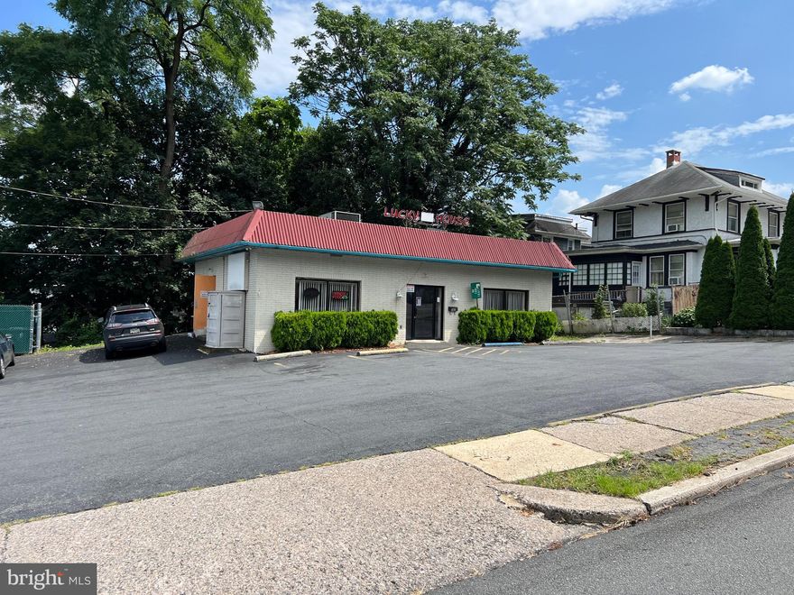 Excellent, detached, 1-story, brick/block structure ideally located on the corner of Carsonia Avenue & Endlich Avenue, in Mt. Penn, with a 1-story, aluminum sided addition. Front main structure is approximately 42' wide by 27' deep. Rear addition is approximately 20' wide by 15-1/4' deep. Entry/exits include main front entry and two emergency side exits. Roof is a built-up flat style. There are 2 large rooms and a powder room in the original structure and one large room in the addition. Floors are primarily tile.  Heating is via a heat pump w/central air.  The property is currently utilized as a restaurant known as “Lucky House”.  Please note, however, the business and all business equipment is owned by Tenant and is not included in this sale.  Rent is currently $1,800/per month plus tenant pays all utilities.  Tenant is wiling to continue leasing, if desired by the new owner.  The current use was granted under a  Special Exception to zoning. Prior use was a pharmacy.  Possible professional office, medical office, retail establishment, or beauty shop, subject however to a zoning hearing approval.  Please note the 5 pages of "High Density Residential (R-4) Zoning"   Uses shown in the "Documents" section of this listing.  Additional features include 10 + front and side parking spaces.  Please note that all numbers, dimensions, and measurements herein are approximations only.  Buyer should verify the same, in order to satisfy self.