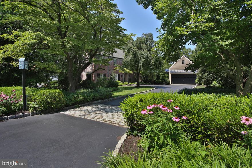 Rare opportunity to own a classic brick colonial on a 1 acre lot in Whitemarsh Township. This 4 bedroom, 2 full and 1 half bath home has been thoughtfully updated and meticulously maintained by the current owners, with over $200K in recent improvements. Hardwood floors, crown molding and unique architectural details can be found throughout the main level.  Large Living Room with hand carved fireplace mantel, gracious Dining Room, renovated Kitchen (2018) with farm sink and stainless steel appliances, step down Family Room with coffered ceiling, built-in cabinetry, brick fireplace and French doors to an enclosed patio and large backyard. Upstairs, a spacious Master Bedroom Suite with walk-in closet and spa-like Master Bathroom, 3 additional Bedrooms, updated Hall Bath (2020) and Laundry. Unfinished Basement offers plenty of storage. Detached, recently renovated 2 car Garage (2019) with storage above and covered breezeway. Other recent updates include new water heater (2020), new HVAC (2016), sewer line replaced from the house to the road (2019), radon remediation system installed (2021). Award winning Colonial School District. Close to restaurants and shopping of Ambler and Chestnut Hill. One Year Home Warranty. Don't miss this special property!